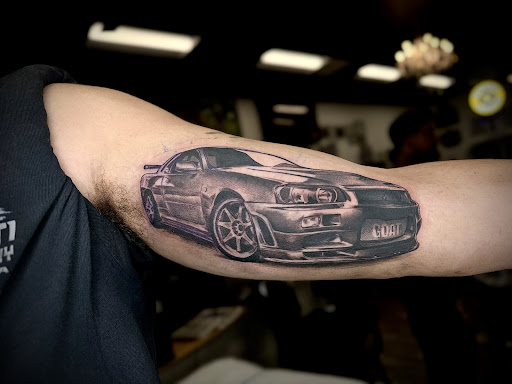 Explore tattoo ideas strong woman, creative tattoo ideas in Albany, available at Primal Instincts Body Art Studio