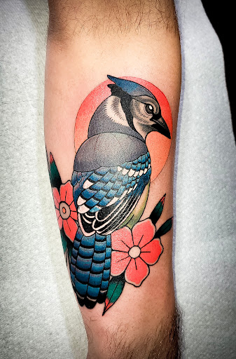 Explore flower arm sleeve tattoo ideas, creative tattoo ideas in Burlington, available at Valkyrie Tattoo LLC