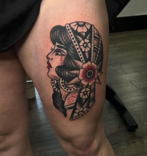 Explore neck tattoo ideas for woman, creative tattoo ideas in Kenosha, available at Kenosha Tattoo Company