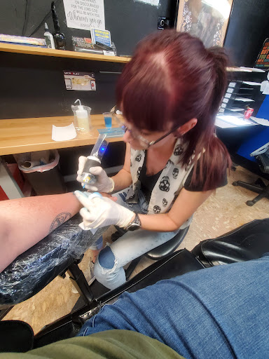 Explore queen of hearts tattoo ideas, creative tattoo ideas in Abilene, available at Ink Image Tattoos