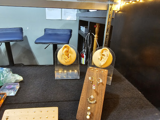 Find angel tattoo ideas for men for your next unique tattoo in Manhattan at Catalyst Piercings