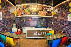 X Cafe & Restaurant image