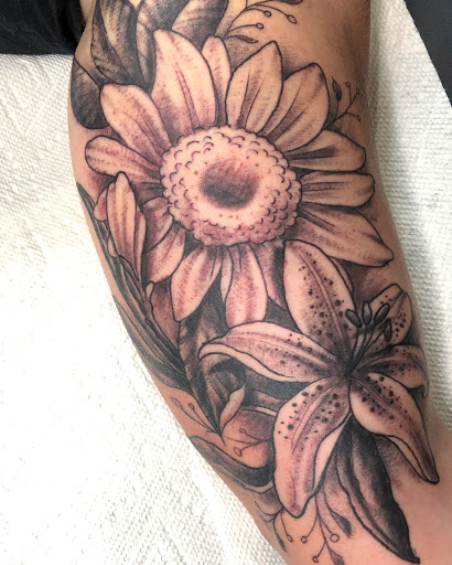 Find heartbeat tattoo ideas for your next unique tattoo in Duluth at Gitchee Gumee Tattoo