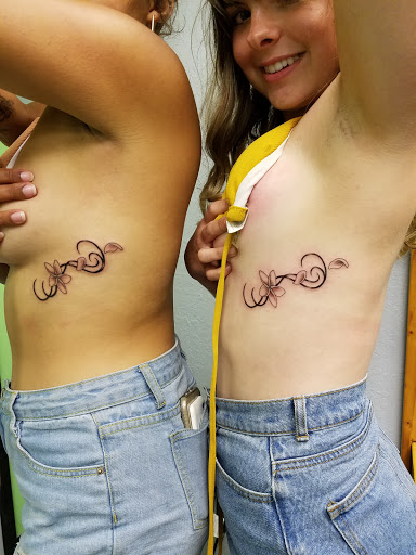 Explore tattoo ideas for women's legs, creative tattoo ideas in Hilo, available at Pacific Island Ink