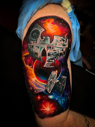 Explore tramp stamp tattoo ideas, creative tattoo ideas in Rochester, available at Three Rivers Tattoo Collective