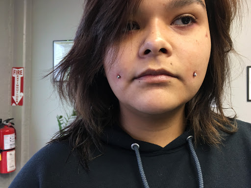 Explore female tattoo ideas ribs, creative tattoo ideas in Denver, available at Dreamscape Piercing and Tattoo LLC