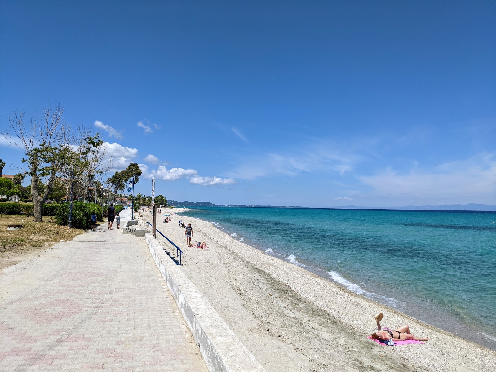 Fotografie cu Hanioti Beach cu o suprafață de nisip beige