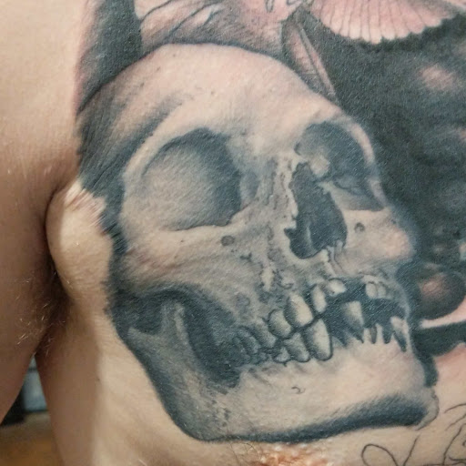 Explore ivf tattoo ideas, creative tattoo ideas in Williston, available at Badlands Tattoo And Piercing