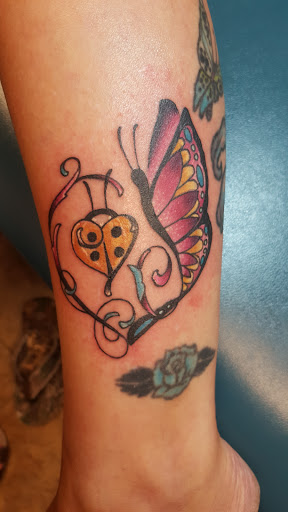 Find crow tattoo ideas for your next unique tattoo in Oshkosh at Big Guns Tattoo Oshkosh