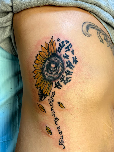 Explore cover up tattoo ideas on hand, creative tattoo ideas in Seymour, available at American Gypsy Tattoo Corp.