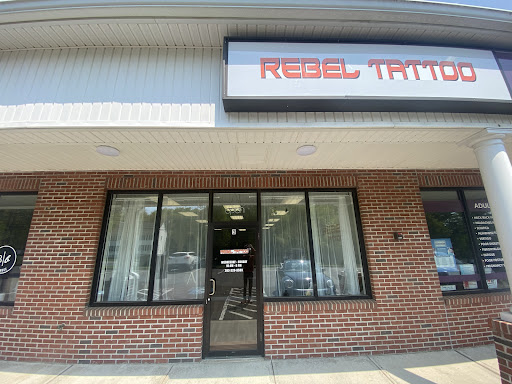 Explore metal tattoo ideas, creative tattoo ideas in Monroe, available at Rebel Tattoo