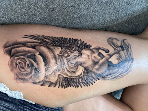 Explore golden retriever tattoo ideas, creative tattoo ideas in Lufkin, available at Blue Lotus Tattoo & Piercing