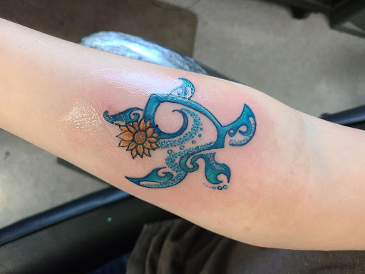 Explore dahlia tattoo ideas, creative tattoo ideas in Waterloo, available at Black Lotus Tattoo Studio