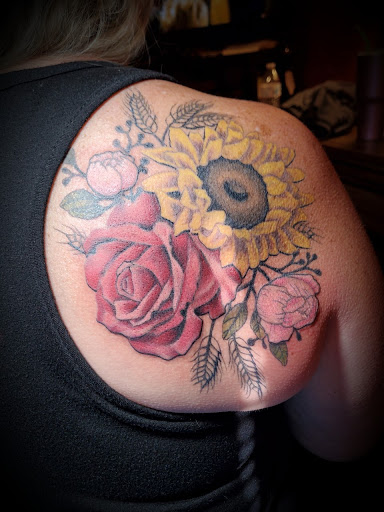 Explore religious tattoo ideas for guys, creative tattoo ideas in Woodward, available at Paper Street Tattoo Company