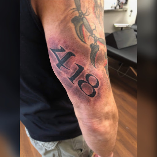 Explore chest and neck tattoo ideas, creative tattoo ideas in Roscoe, available at Elevated Ink Tattoo