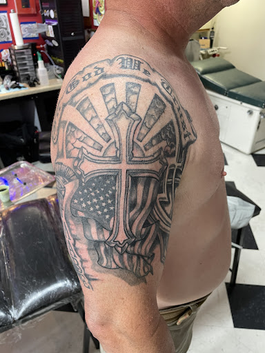 Explore black and grey tattoo filler ideas, creative tattoo ideas in Waynesboro, available at Extreme Expressions