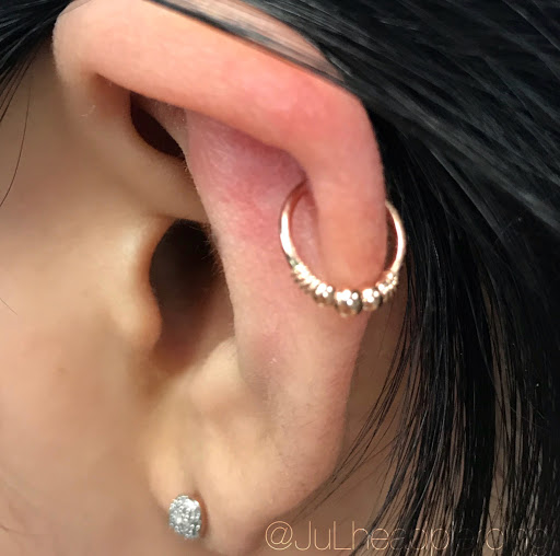 Explore tattoo name placement ideas, creative tattoo ideas in Alhambra, available at JuL head