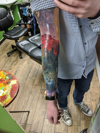 Explore hand tattoo cover up ideas, creative tattoo ideas in Oklahoma City, available at Mind Bender Tattoo