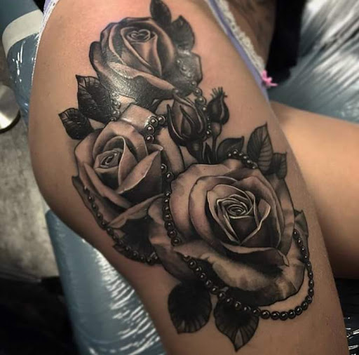 Explore ghost ship tattoo ideas, creative tattoo ideas in Geneva, available at Amazing Grace Tattoo & Piercing
