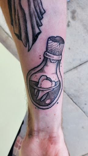 Explore latitude and longitude tattoo ideas, creative tattoo ideas in Omaha, available at Ironwood Ink