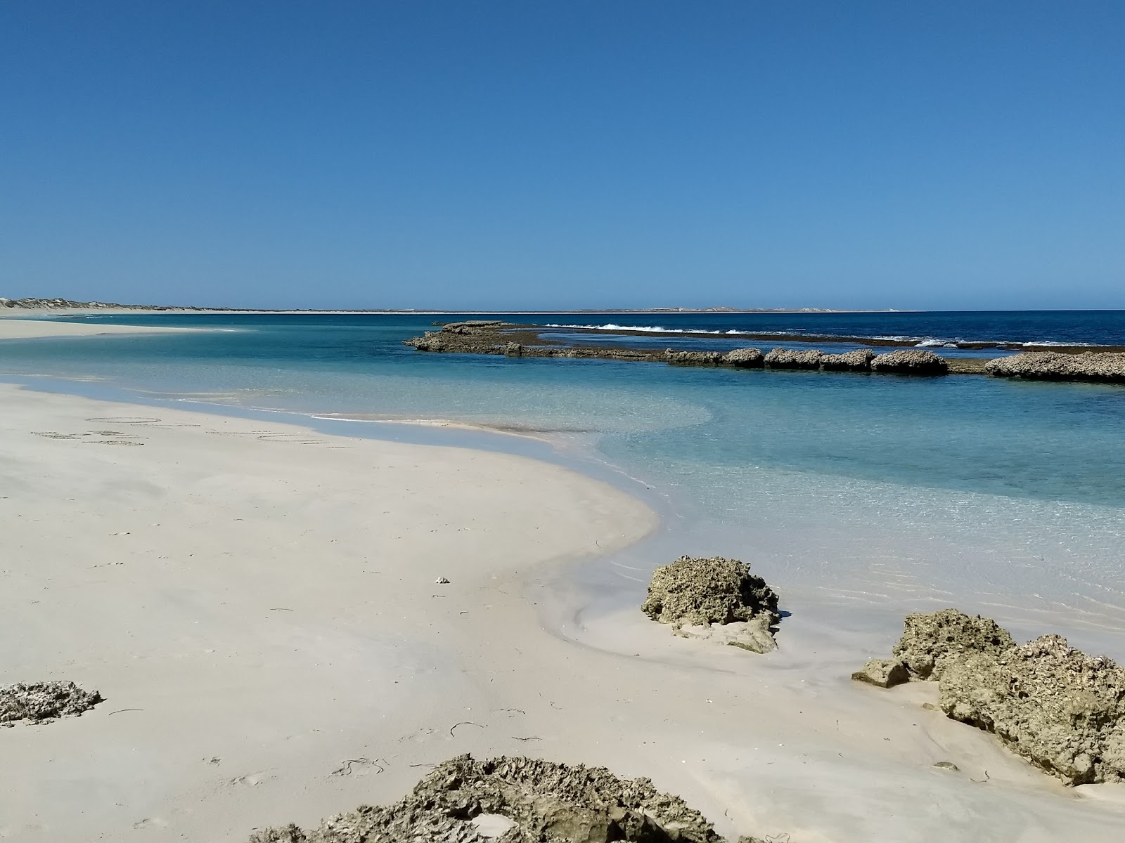 Oyster Bridge Beach'in fotoğrafı - rahatlamayı sevenler arasında popüler bir yer