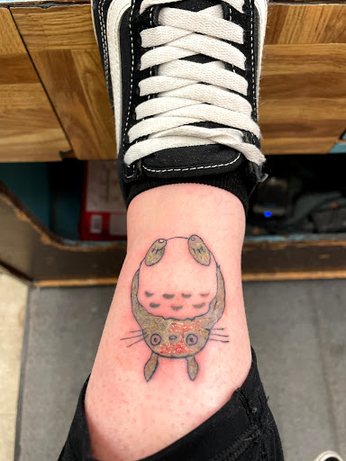 Explore small guy tattoo ideas, creative tattoo ideas in Osceola, available at Valley Of The Inkd