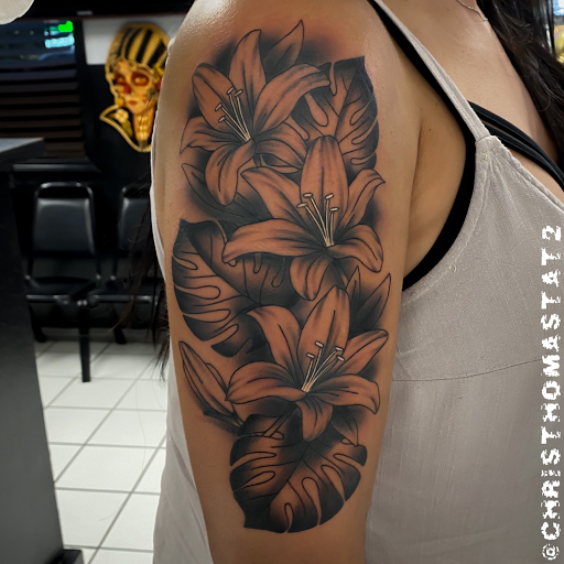 Explore snake tattoo ideas for guys, creative tattoo ideas in Sherwood, available at Golden Lotus Tattoo Studio