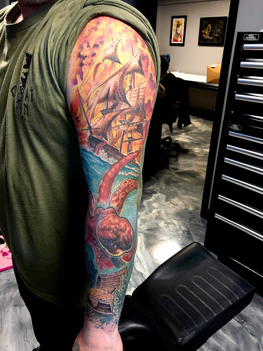 Explore cobra tattoo ideas, creative tattoo ideas in Edgewood, available at Evolved Body Arts