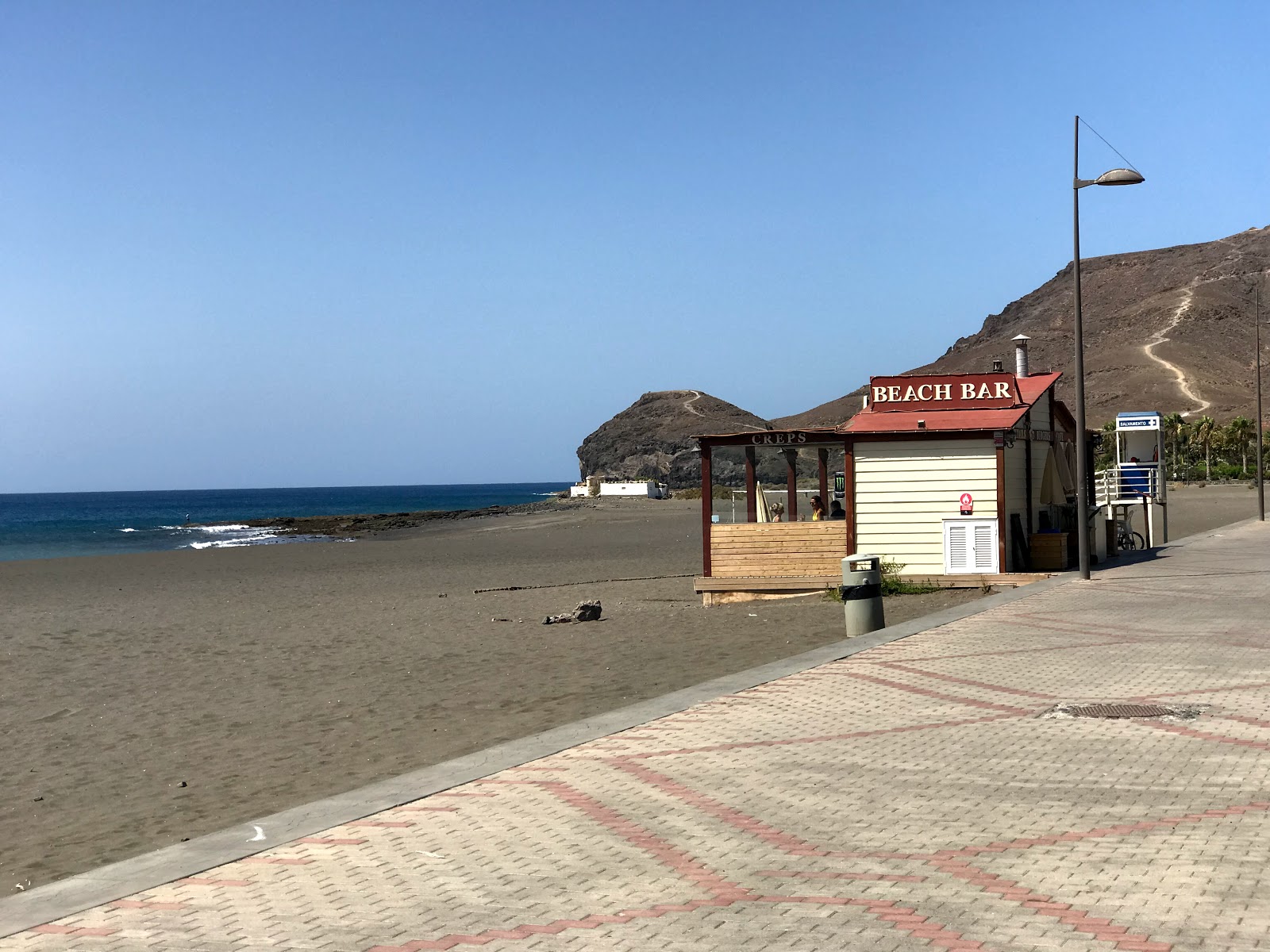 Photo de Playa de los Pobres avec petite baie