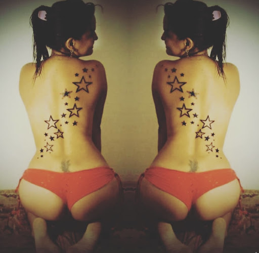 Explore charm tattoo ideas, creative tattoo ideas in Downey, available at Superior Ink Tattoo and Piercings