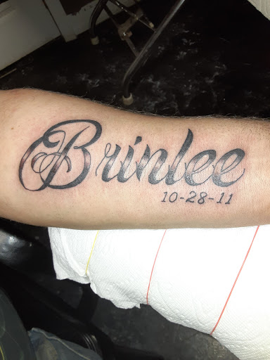 Explore cute face tattoo ideas, creative tattoo ideas in Reedsville, available at Rock Shop Tattoos