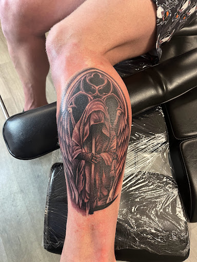 Explore gangsta tattoo ideas, creative tattoo ideas in Belleville, available at Dark Horse Tattoo Company, LLC