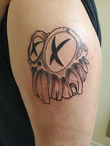 Explore toxic tattoo ideas, creative tattoo ideas in Ozark, available at Tooth & Nail Tattoo & Piercing