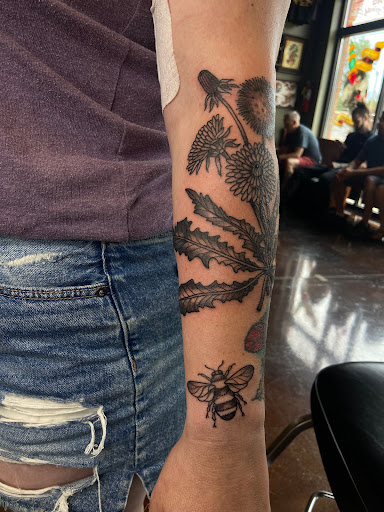 Explore dog paw tattoos ideas, creative tattoo ideas in Des Moines, available at Iron Heart Tattoo