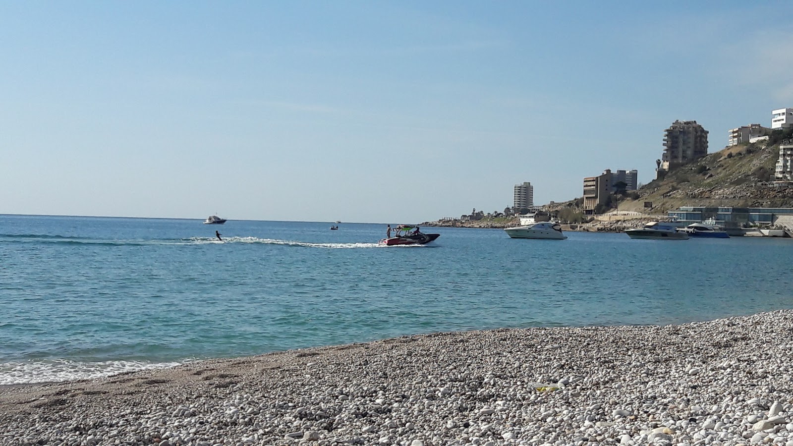 Fotografija Tamary Beach in naselje