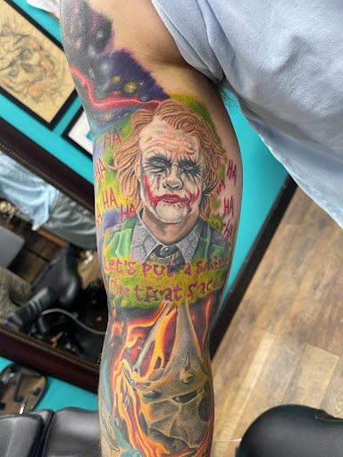 Explore mens script tattoo ideas, creative tattoo ideas in Wichita, available at Addictions In Ink