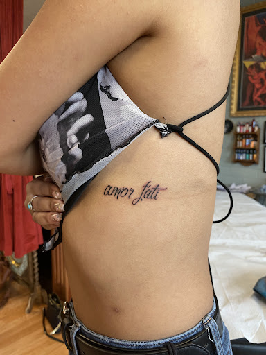 Explore fishing pole tattoo ideas, creative tattoo ideas in Tucson, available at The Painted Lady Tattoo