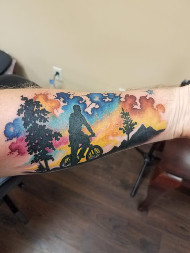 Explore knee surgery tattoo ideas, creative tattoo ideas in Saint Paul Park, available at Lady Liberty Tattoo