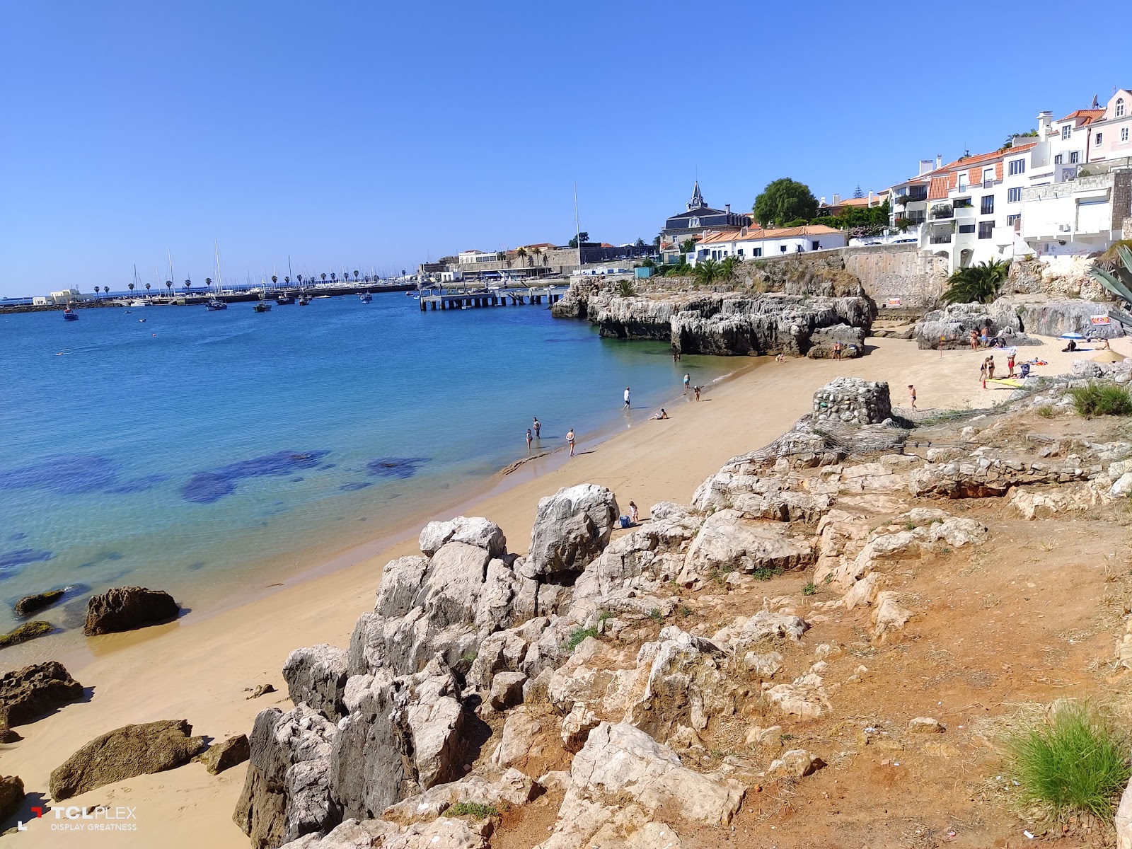 Fotografie cu Praia da Rainha cu o suprafață de nisip fin strălucitor