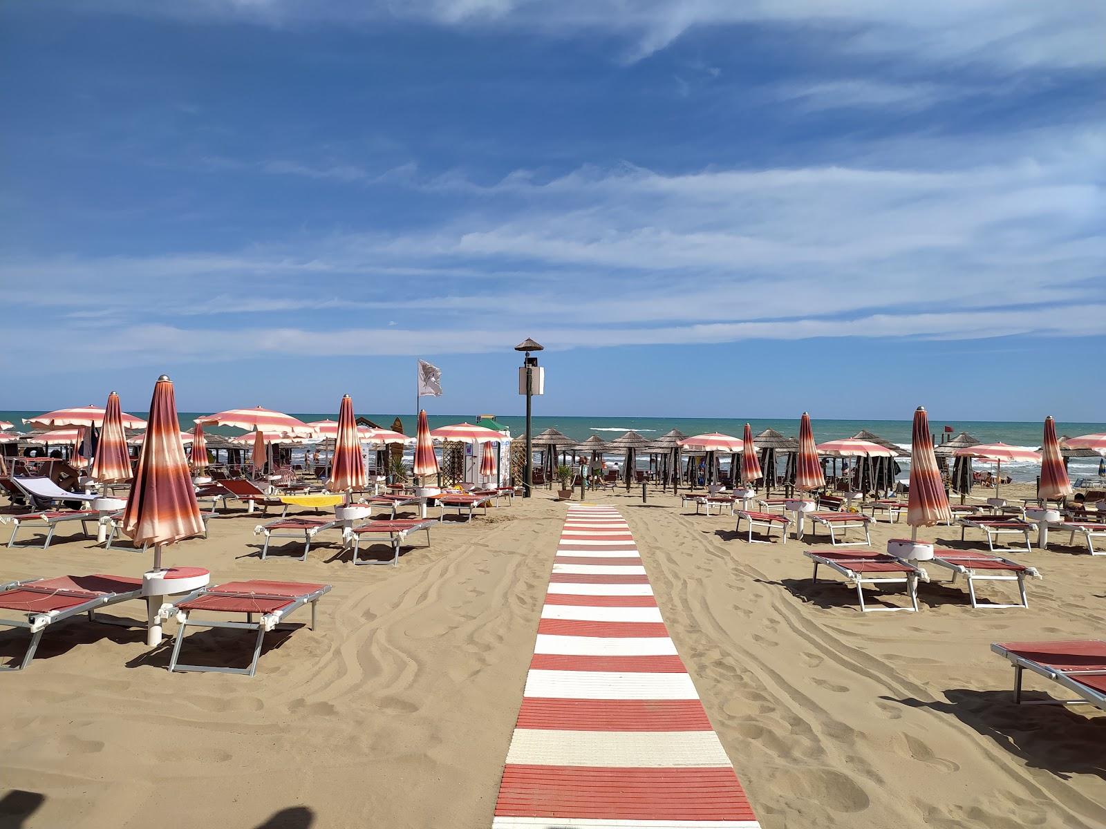 Photo de Spiaggia di Lido del Sole - bon endroit convivial pour les animaux de compagnie pour les vacances