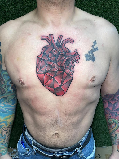 Explore true north tattoo ideas, creative tattoo ideas in Cocoa, available at Rorschach Tattoo Shop and Piercing Studio