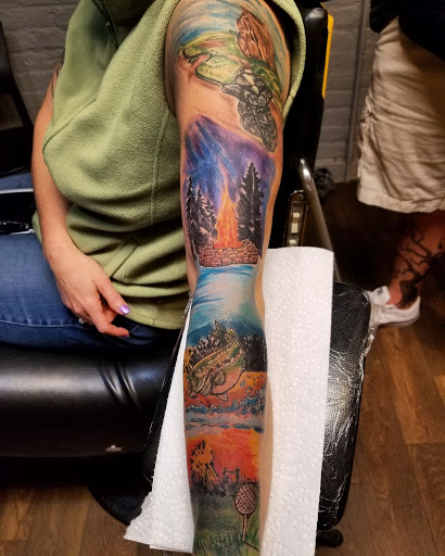 Explore tribal wolf tattoo ideas, creative tattoo ideas in Cumberland, available at Queen City Ink