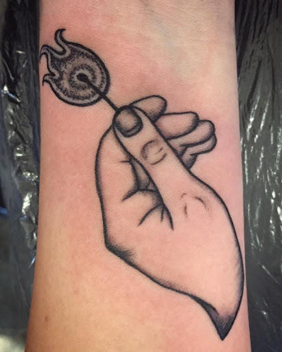 Explore dolphin tattoo ideas for females, creative tattoo ideas in Sioux Falls, available at Permanent Addictions