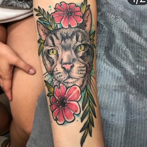 Explore tattoo ideas for female thigh, creative tattoo ideas in Southaven, available at Illusion Ink