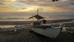 Foto van Cawitan Beach met hoog niveau van netheid