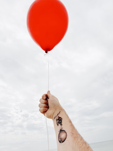 Explore 2 child tattoo ideas for dad, creative tattoo ideas in Pensacola, available at Pensacola Tattoo Studio