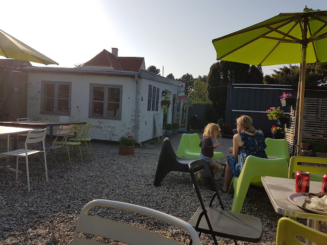 Åbningstider for Den Røde Tomat