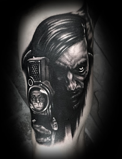 Explore rip cross tattoo ideas, creative tattoo ideas in Oviedo, available at Homesick Tattoo Studio & Gallery