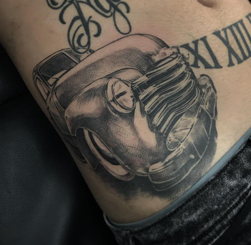 Explore sun tattoo ideas for guys, creative tattoo ideas in Denver, available at Think Tank Tattoo