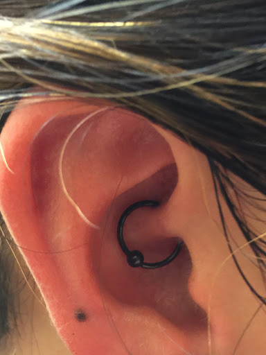 Explore men's behind the ear tattoo ideas, creative tattoo ideas in San Diego, available at Body Art Salon